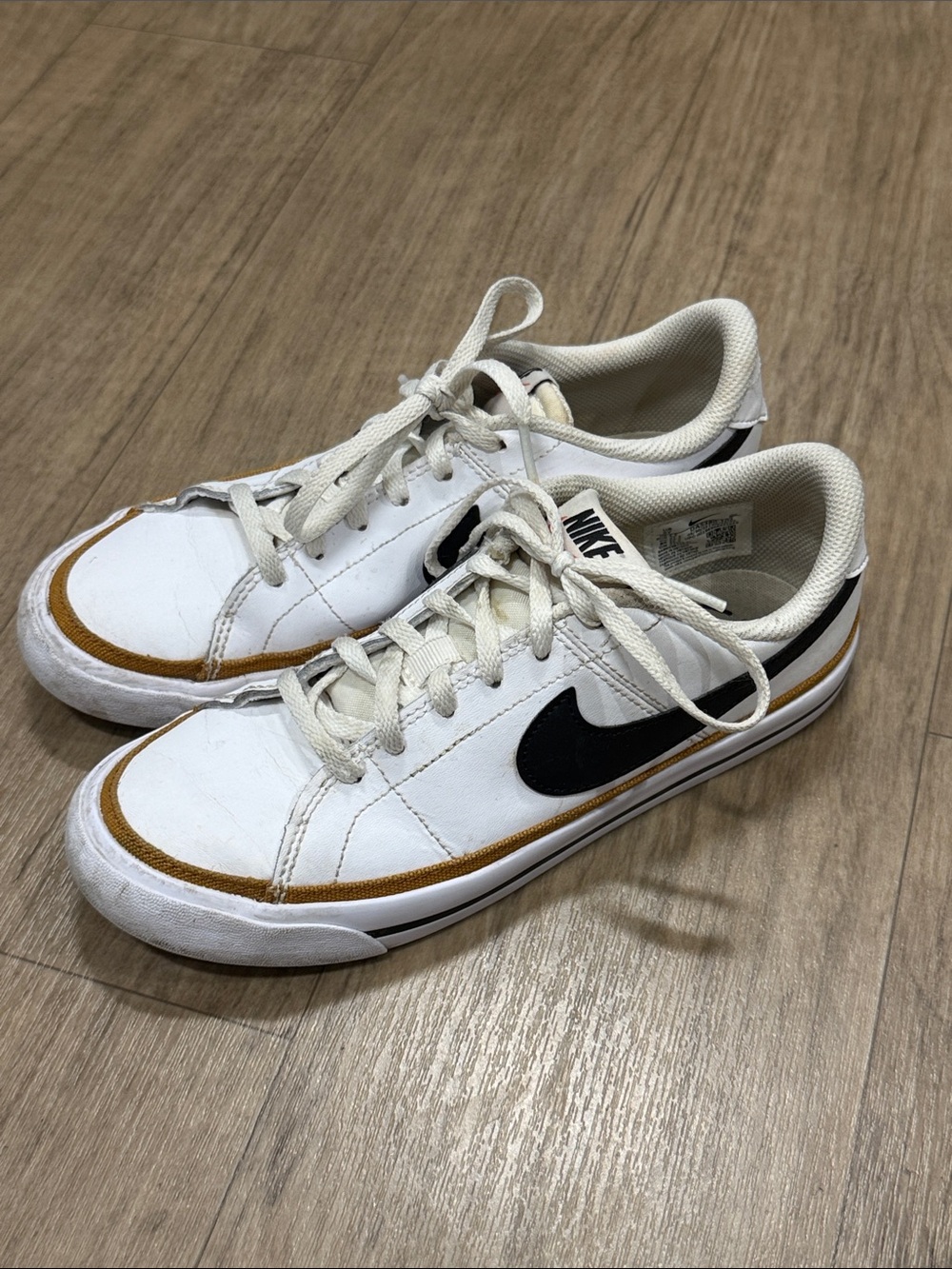 Nike Women’s Court Legacy Nature White Sneakers with Black Swoosh and Brown Trim
